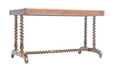 A William IV 19th century rosewood library / writing table desk. Raised on shaped bobbin turned legs united by central bobbin stretcher to splayed feet. Above, a fitted frieze with rectangular top having rounded corners. Measures approx. 68 x 120 x 65cm.