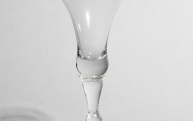 A baluster wine glass c.1740, with a bell...