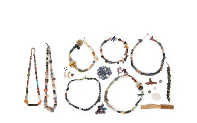 A collection of beads, a bone fragment and an amethyst necklace Various...