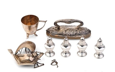 A collection of silver items to include a nail buffer, a mod...
