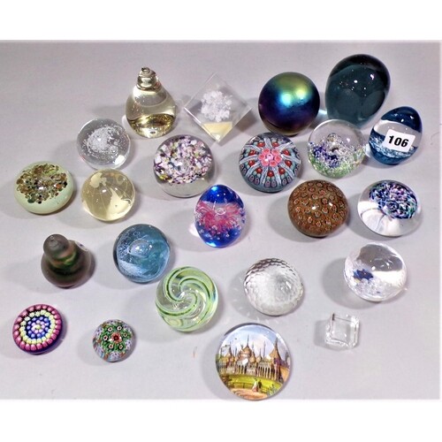 A collection of twenty two paperweights to include millefior...