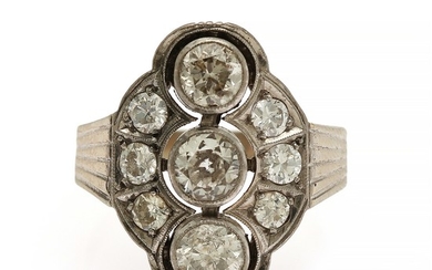 A diamond ring set with nine brilliant-cut diamonds, totalling app. 1.84 ct., mounted in 14k white gold. Front app. 14×20 mm. Size 55. Circa 1950.
