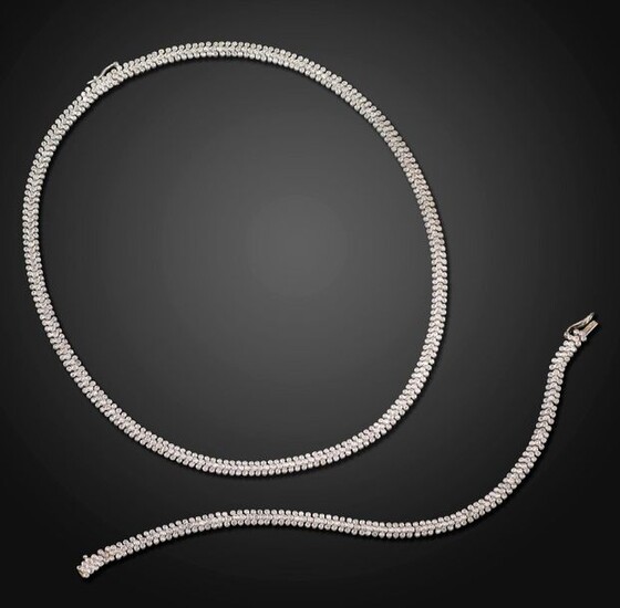 A diamond-set necklace and bracelet, each set with round brilliant-cut...