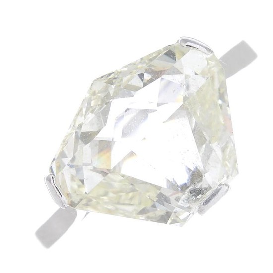 A diamond single-stone ring. The fancy-shape diamond
