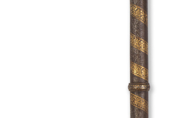 A fine Mughal gold-koftgari watered-steel saddle axe (tabarzin) North India,...