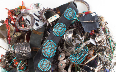 A group of silver jewelry, inclu Native American