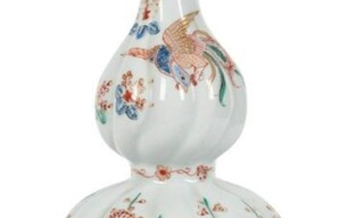 A kakiemon spirally-moulded double-gourd vase. Fuku