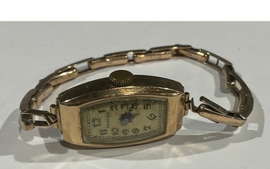 A lady's 9ct rose gold Perfex watch, canted rectangular face...