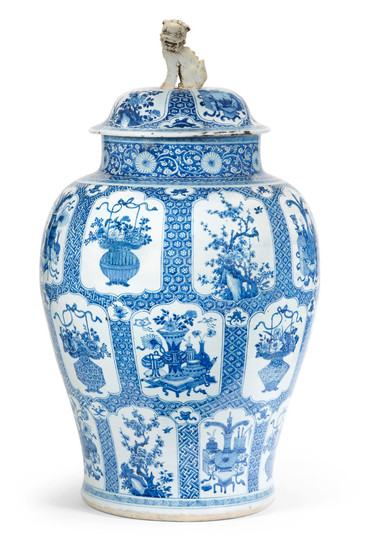 A large blue and white 'Hundred Antiques' jar and cover