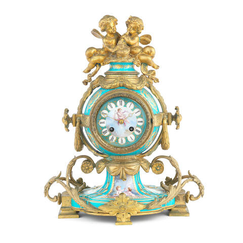 A late 19th century French gilt bronze mounted Sèvres-style porcelain figural mantel clock the movement stamped Raingo Frères