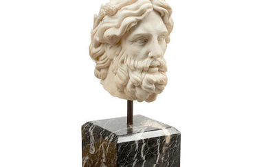 A marble head of a bearded man