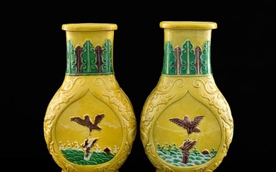 A near pair of Chinese yellow-ground sancai vases, Republic period