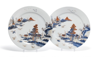 A pair of Chinese Imari porcelain dishes decorated in colours and gold with scenery and architecture. Qianlong 1736–1795. Diam. 35 cm. (2)