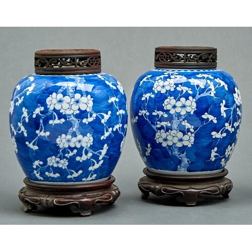 A pair of Chinese blue and white prunus-on-cracked-ice jars,...