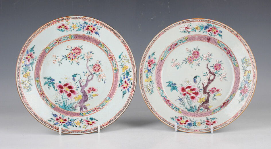 A pair of Chinese famille rose porcelain plates, Yongzheng period, each painted with flowers, diamet