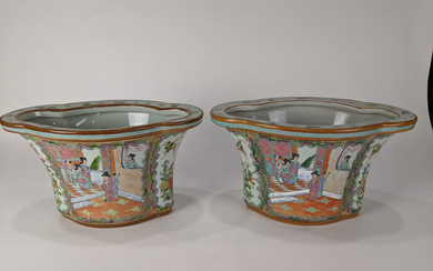 A pair of Chinese famille rose style jardinieres