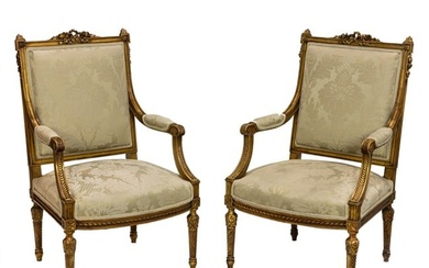 A pair of Louis XVI giltwood carved fauteuils circa 1860