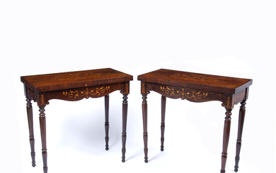 A pair of Victorian mahogany fold over top card tables...