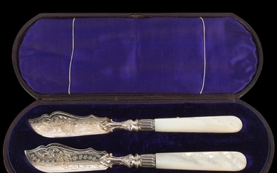 A pair of Victorian silver mother-of-pearl handled butter kn...