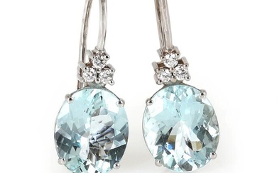 A pair of aquamarine and diamond ear pendants each set with an...