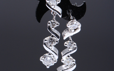 A pair of brilliant earrings of 18 kt. white gold - total approx. 1.30 ct.