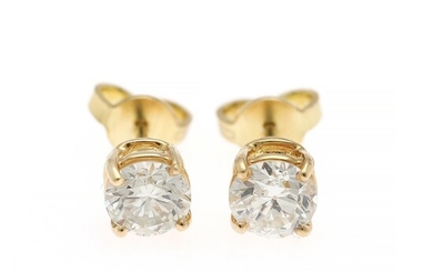 A pair of diamond ear studs each set with a diamond weighing a total of app. 1.47 ct., mounted in 18k gold. L-M/VS. (2)