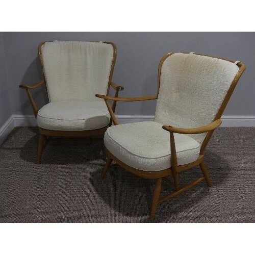 A pair of mid 20thC Ercol beech spindle back Easy Chairs, Mo...