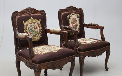 A pair of rococo style armchairs, second half of the 20th century.
