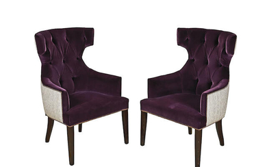 A pair of velvet upholstered wingback armchairs