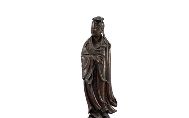 A parcel-gilt bronze figure of a Daoist immortal, Ming dynasty 明 銅局部鎏金道教人物立像