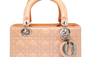 A pink Christian Dior Cannage quilted patent leather Lady...