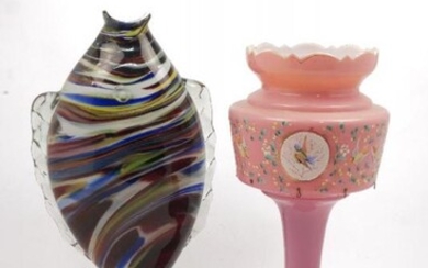 A pink glass vase of baluster form...