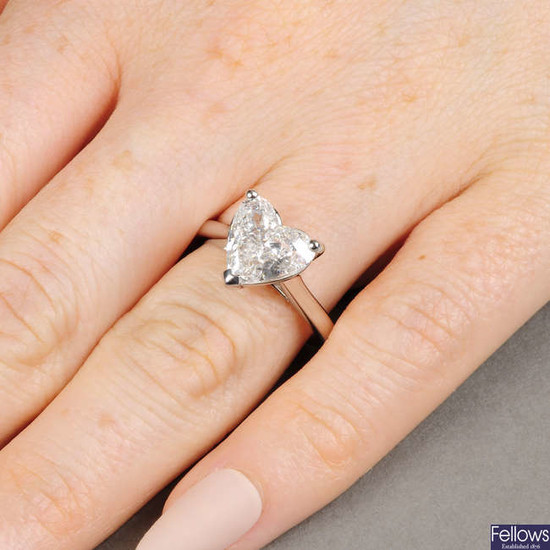 A platinum heart-shape diamond single-stone