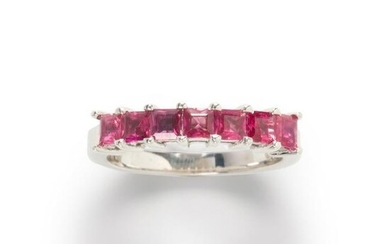 A ruby and fourteen karat white gold ring