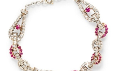 A ruby, diamond and silver-topped eighteen karat gold