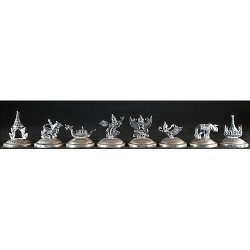 A set of eight Siamese silver novelty menu holders, in the f...