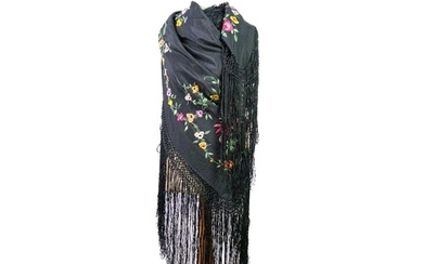 A silk piano shawl. The black ground embroidered with colour...