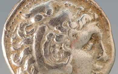 A silver drachm in the name of Alexander III...