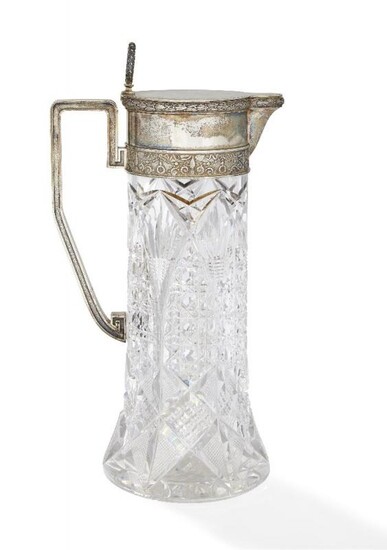 A silver mounted cut glass water pitcher,...