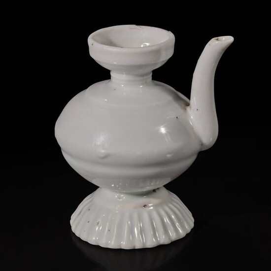 A small Chinese white glazed porcelain ewer 白