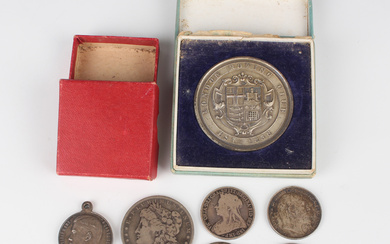 A small collection of 19th and early 20th century coins and medals, including a rare Imperial Russia