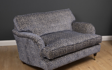 A small modern deep two seater sofa