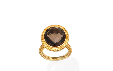 A smokey quartz and yellow sapphire dress ring, by Theo Fennell