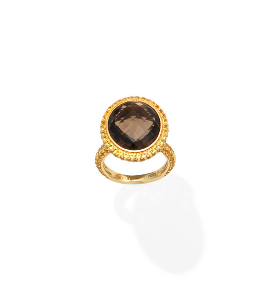 A smokey quartz and yellow sapphire dress ring, by Theo Fennell