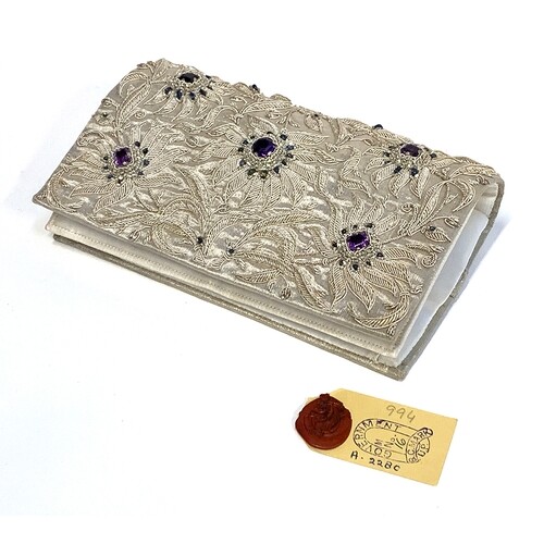 A vintage Indian Zari clutch purse, with profuse silver thre...
