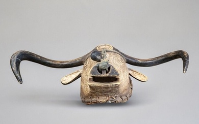 AN AFRICAN CARVED WOODEN TABWA BULL MASK Protruding horns an...