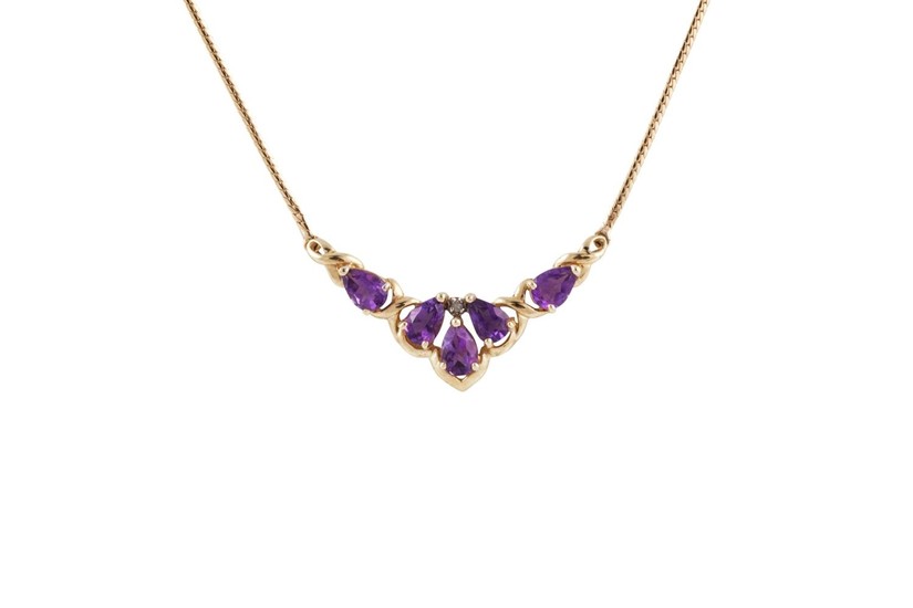 AN AMETHYST NECKLACE, mounted in yellow gold, to a gold back...