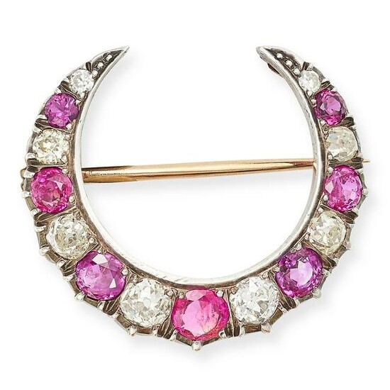 AN ANTIQUE VICTORIAN RUBY AND DIAMOND CRESCENT MOON BROOCH designed as a crescent moon, set with