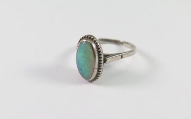 AN OPAL AND SILVER RING