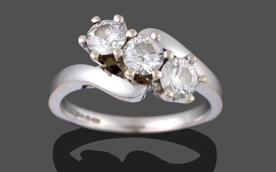 An 18 Carat White Gold Diamond Three Stone Twist Ring,...